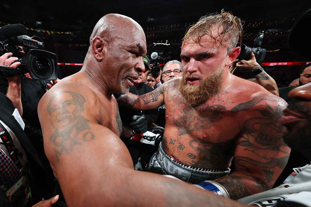 arlington, texas - november 15: jake paul (r) announced as winner against mike tyson (l) during live on netflix: jake paul vs. mike tyson at at and t stadium on november 15, 2024 in arlington, texas. 