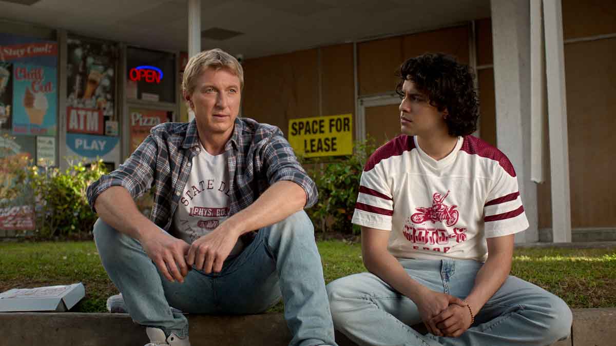 cobra kai. (l to r) william zabka as johnny lawrence, xolo maridueña as miguel diaz in cobra kai. cr. courtesy of netflix © 2024